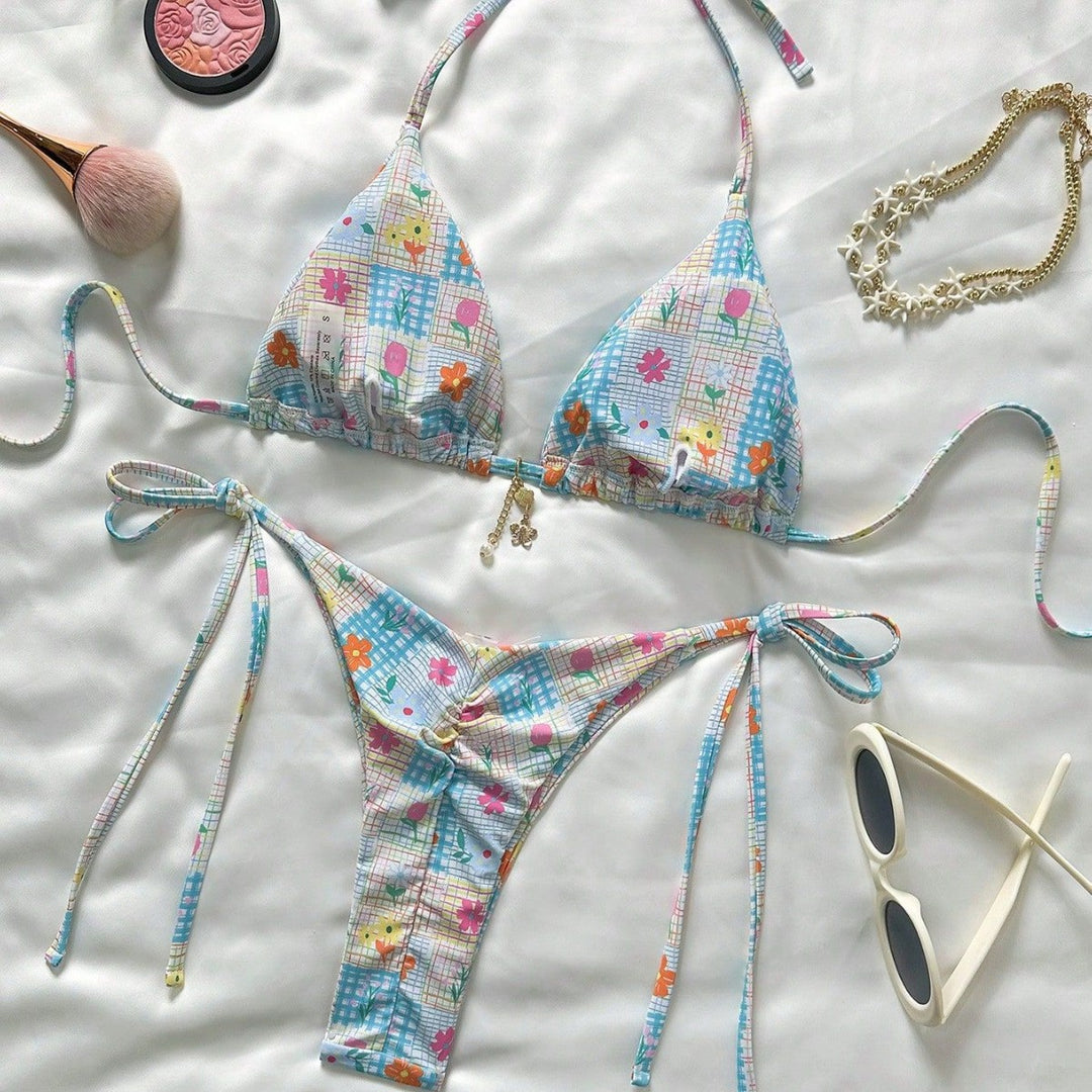 Ladies triangle bikini with playful flower details Mune Fashion