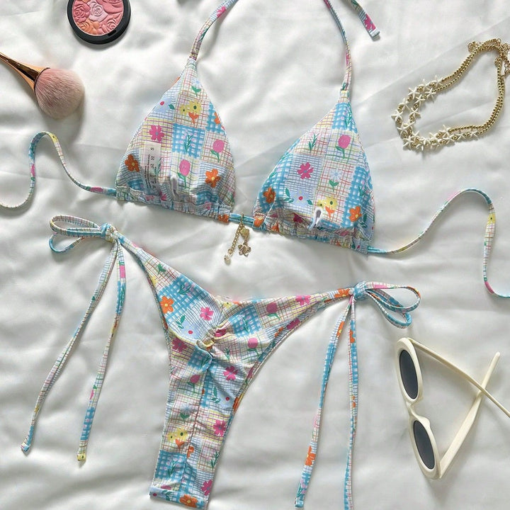 Ladies triangle bikini with playful flower details Mune Fashion