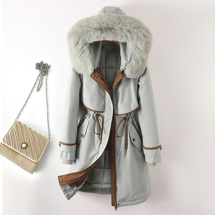 Women's long parka with faux fur hood, waist drawstring, and contrasting piping Mune Fashion