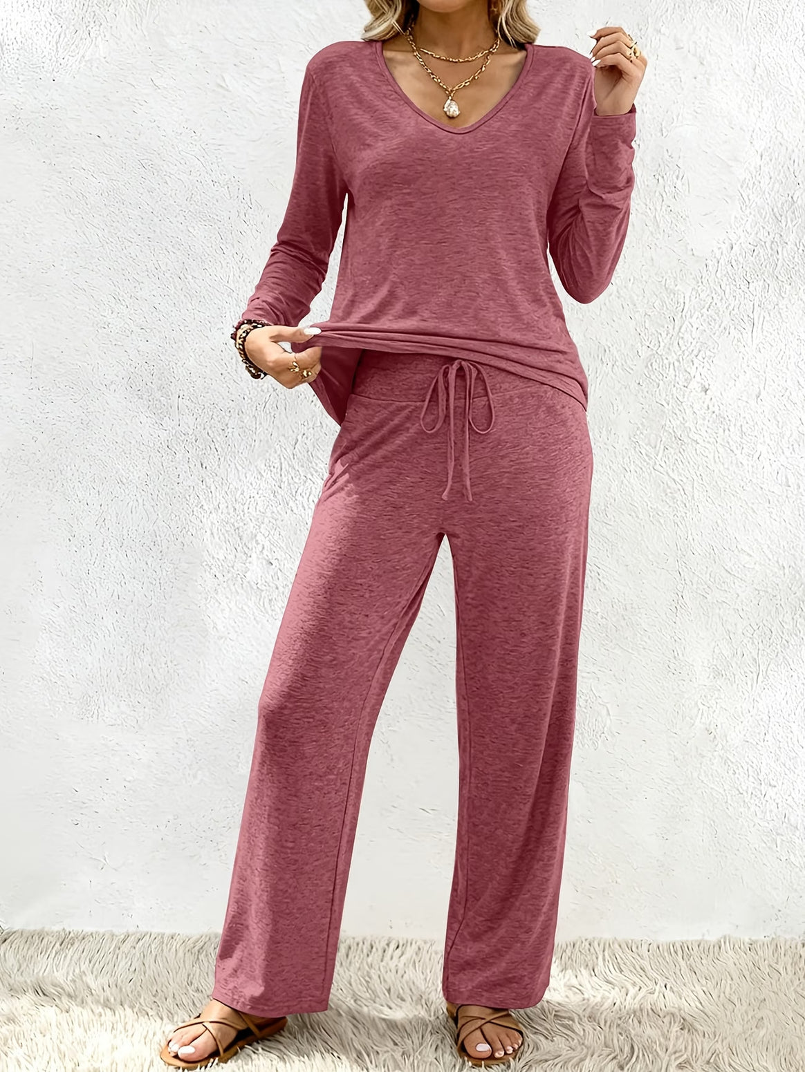 Women’s lounge set made of soft viscose-modal blend with V-neck, drawstring pants, and wide leg Mune Fashion