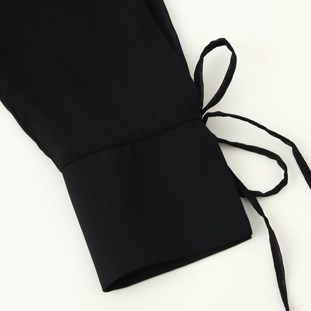 Women’s chiffon blouse with sequin trim, deep V-neck and decorative tie bands Mune Fashion