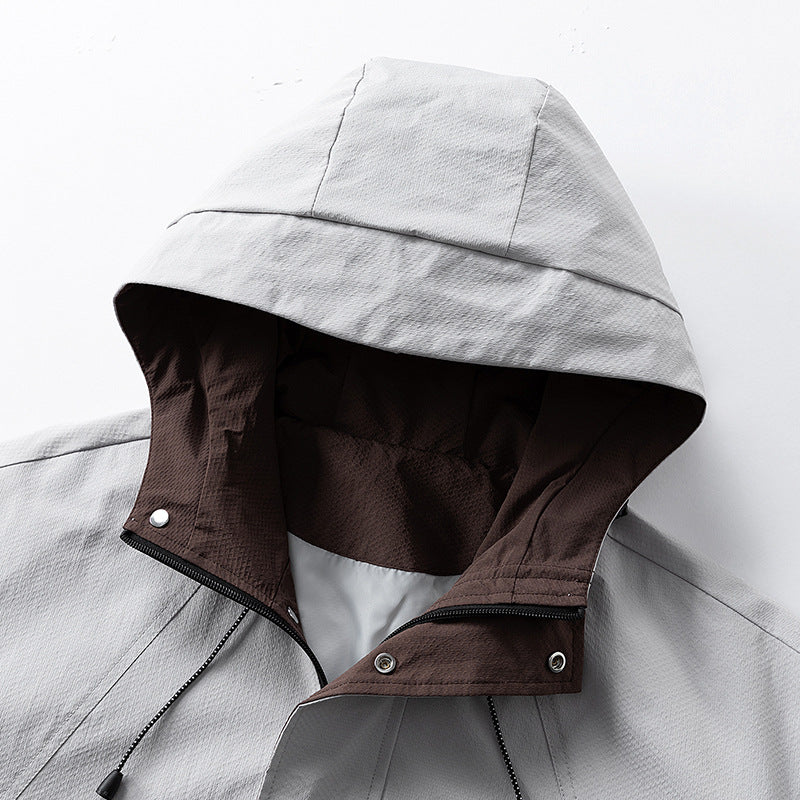 Unisex lightweight windproof outdoor jacket with hood, water-repellent outer shell and adjustable hem Mune Fashion