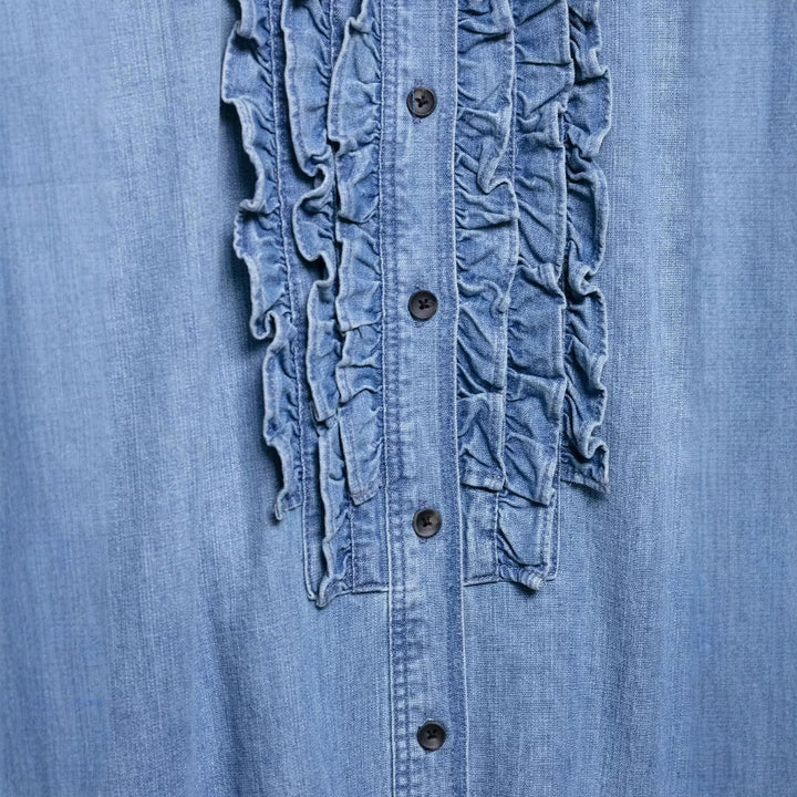 Women's chambray blouse with ruffled button placket, shirt collar and extended hem Mune Fashion