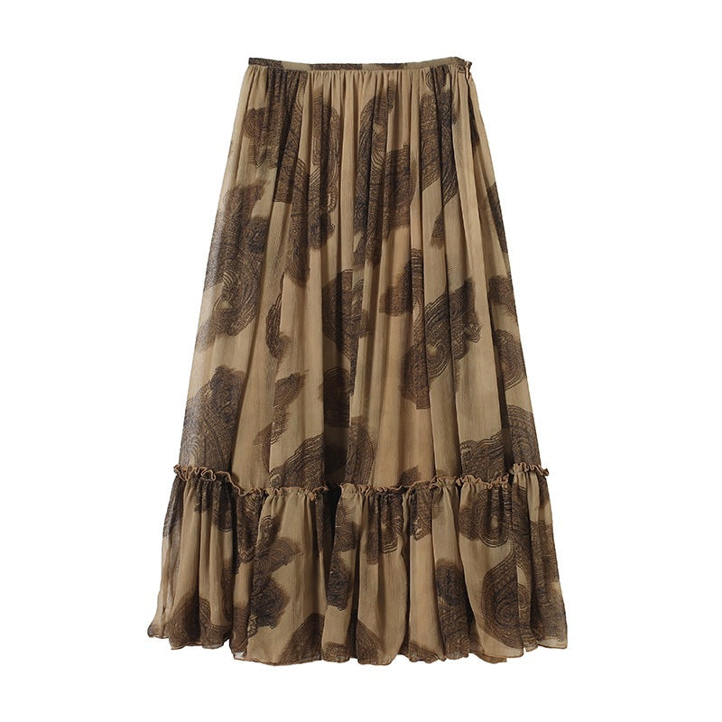 Women's maxi skirt made of chiffon with pleats, elastic waistband, and ruffled hem Mune Fashion