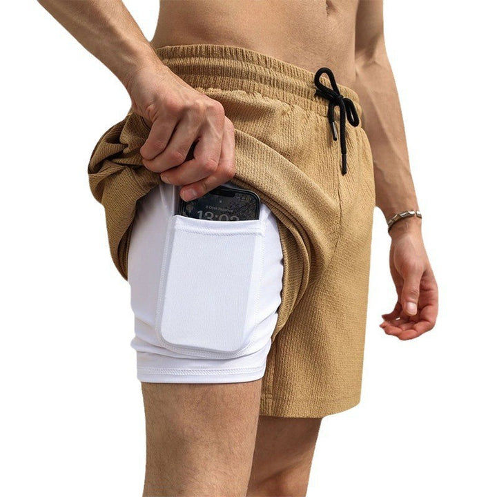 Men's two-layer swim shorts with integrated compression inner shorts and hidden cell phone pocket Mune Fashion