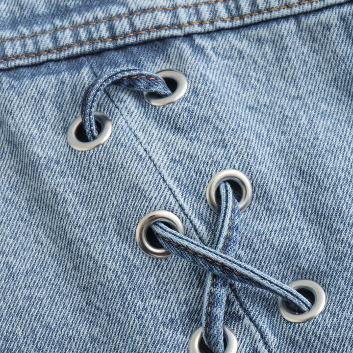 Women's cropped oversized jeans jacket with drawstring hem, patch chest pockets, and metal button placket Mune Fashion