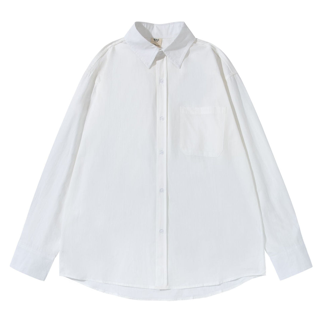 Unisex Boxy shirt with Kent collar, applied breast pocket and relaxed fit Mune Fashion