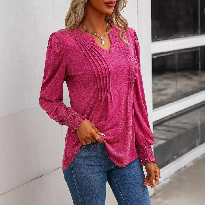Women's long sleeve shirt with V-neckline, decorative inverted pleats at the front and elastic smocked cuffs Mune Fashion