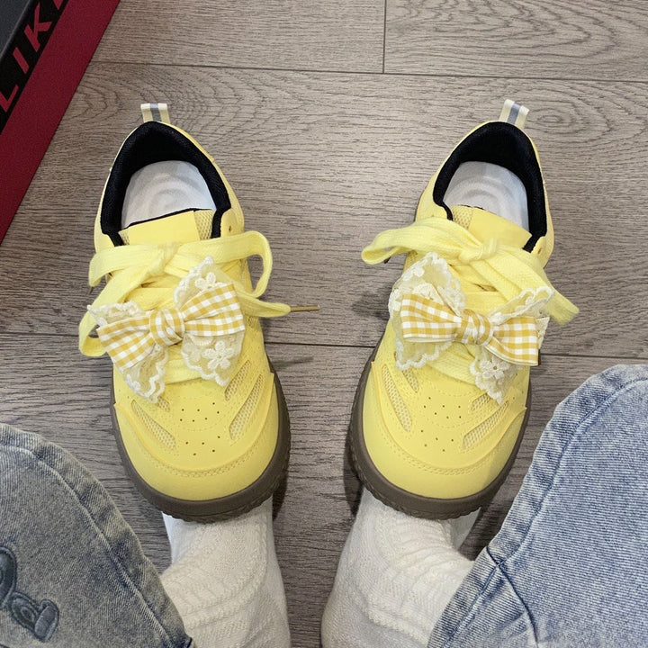Women's sneakers with playful bow design by Mune Fashion