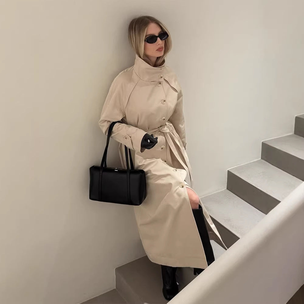 Ladies maxilength trench coat with high stand-up collar, double-breasted button placket and tie belt Mune Fashion