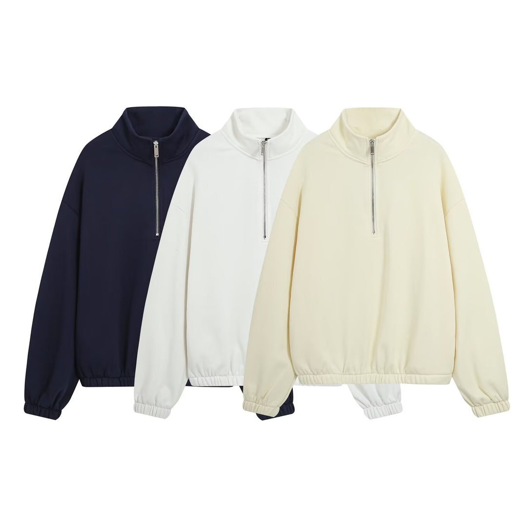 Women’s oversized pullover with half zip stand collar, elastic hem, and drop shoulders Mune Fashion