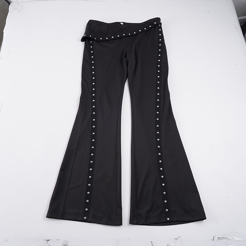 Women’s flared trousers with wrap waistband and decorative press stud placket Mune Fashion