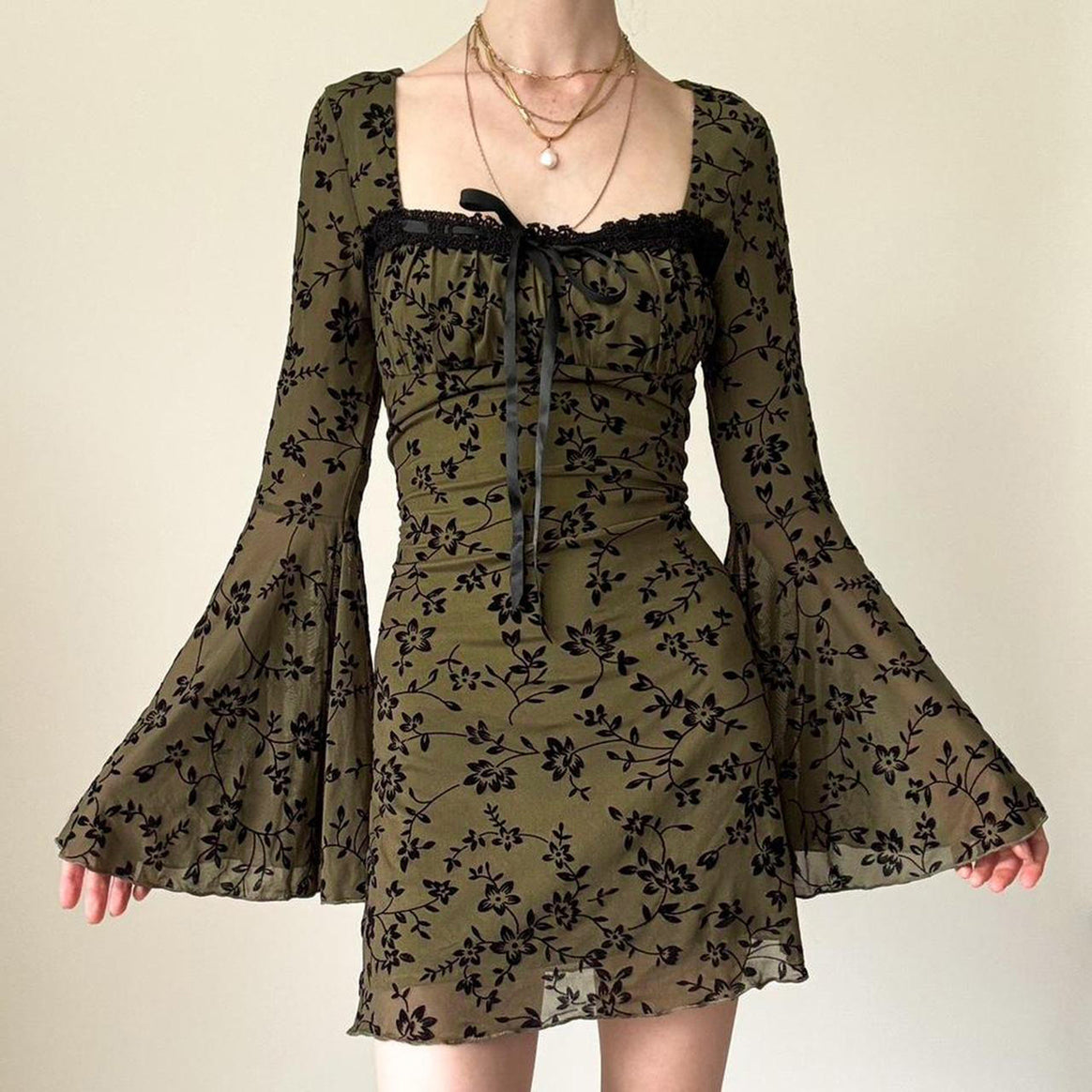 Women's chiffon mini dress with velvet flock floral pattern, empire waist and bell sleeves Mune Fashion