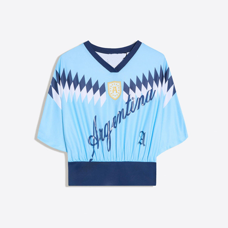 Women’s tailored retro soccer crop shirt with V-neck, elastic hem, and embroidered lettering Mune Fashion