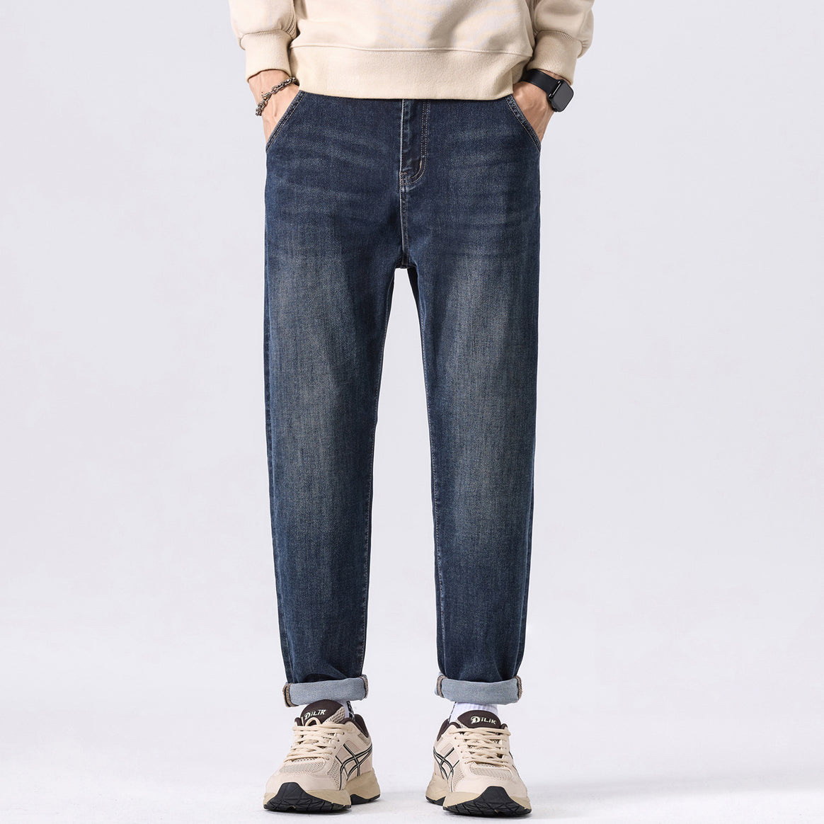Men's tapered casual jeans with a mid-rise and subtle used wash Mune Fashion