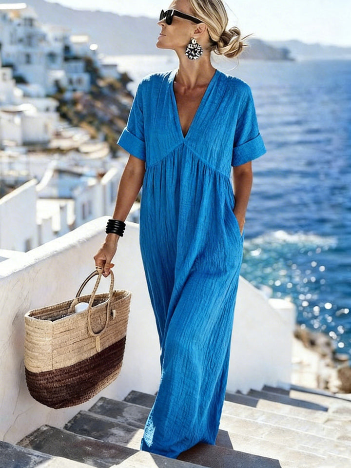 Women's maxi dress with a casual cut and side pockets Mune Fashion