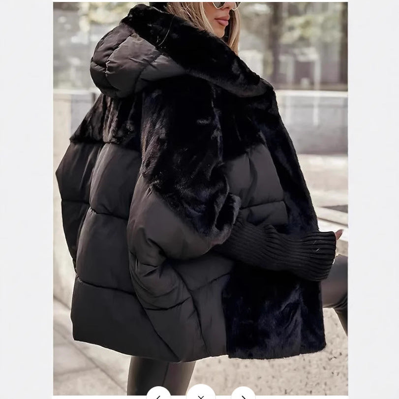 Women's oversized quilted winter jacket with faux fur panels, hood and integrated ribbed sleeve details Mune Fashion