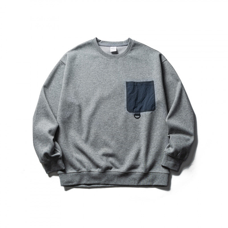 Unisex Oversized Sweatshirt with applied chest pocket and D-ring Mune Fashion