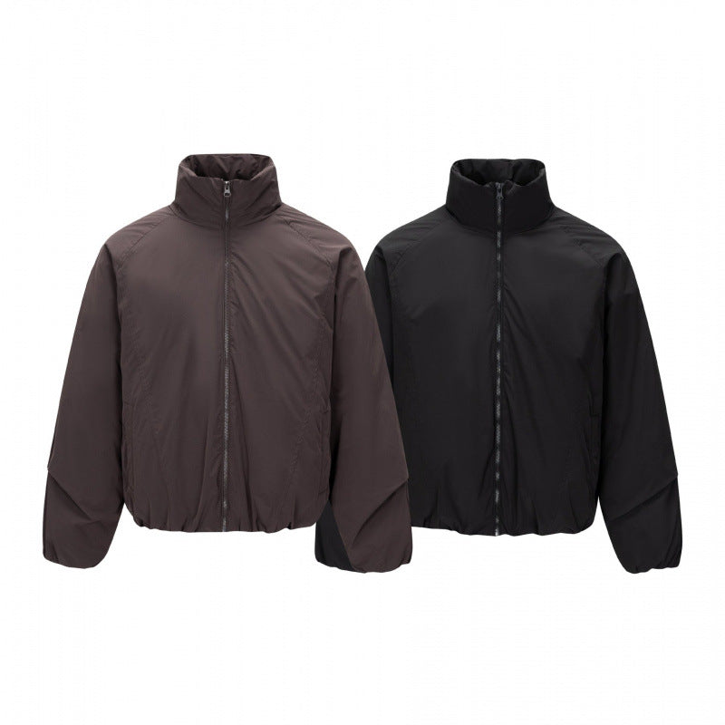 Unisex Short cut lightweight windbreaker in boxy cut with high stand-up collar and elastic hem Mune Fashion
