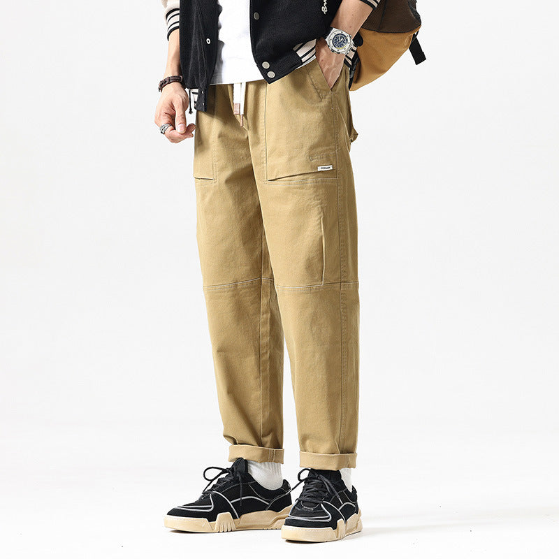 Herren Baggy-Utility-Cargohose im Tapered-Schnitt mit elastischem Tunnelzugbund, aufgesetzten Fronttaschen und Knieabnähern Mune Fashion