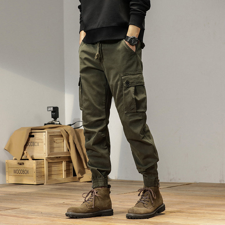 Men's robustly cut canvas cargo jogging pants with drawstring waist, knee patches, and elastic ankle cuffs Mune Fashion