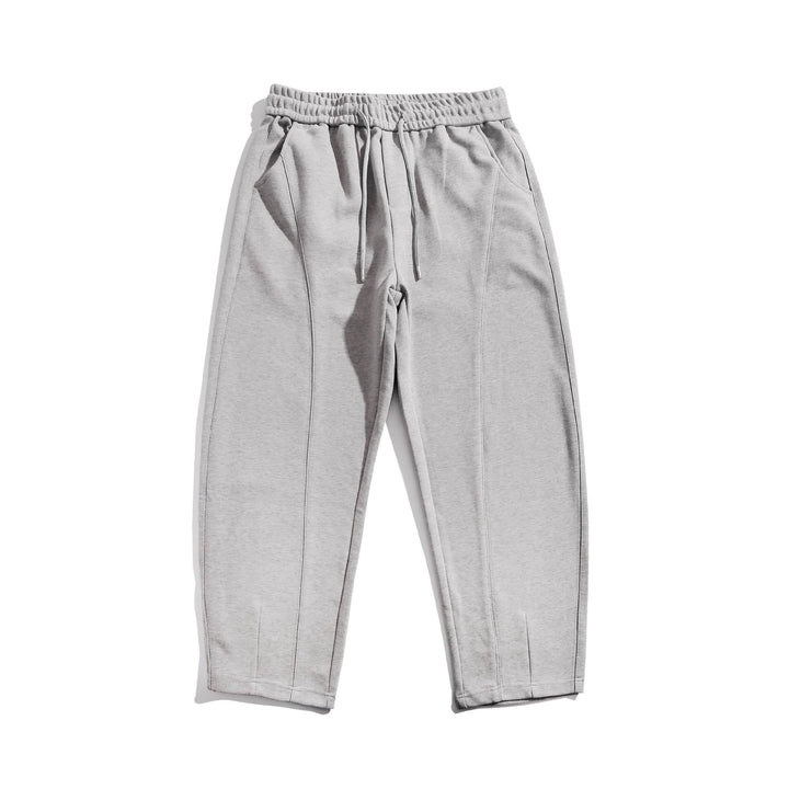 Women's cropped jogger pants with decorative seams, high elastic waistband and side pockets