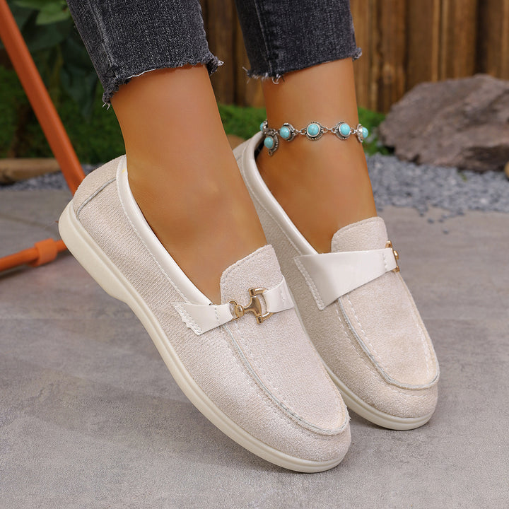 Ladies elegant suede slippers with decorative metal hardware and flexible easy-running sole Mune Fashion