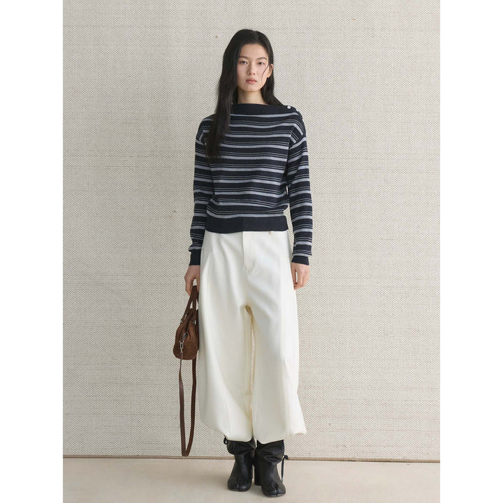 Ladies fine knit sweater with asymmetric boat neckline and fine block stripes Mune Fashion
