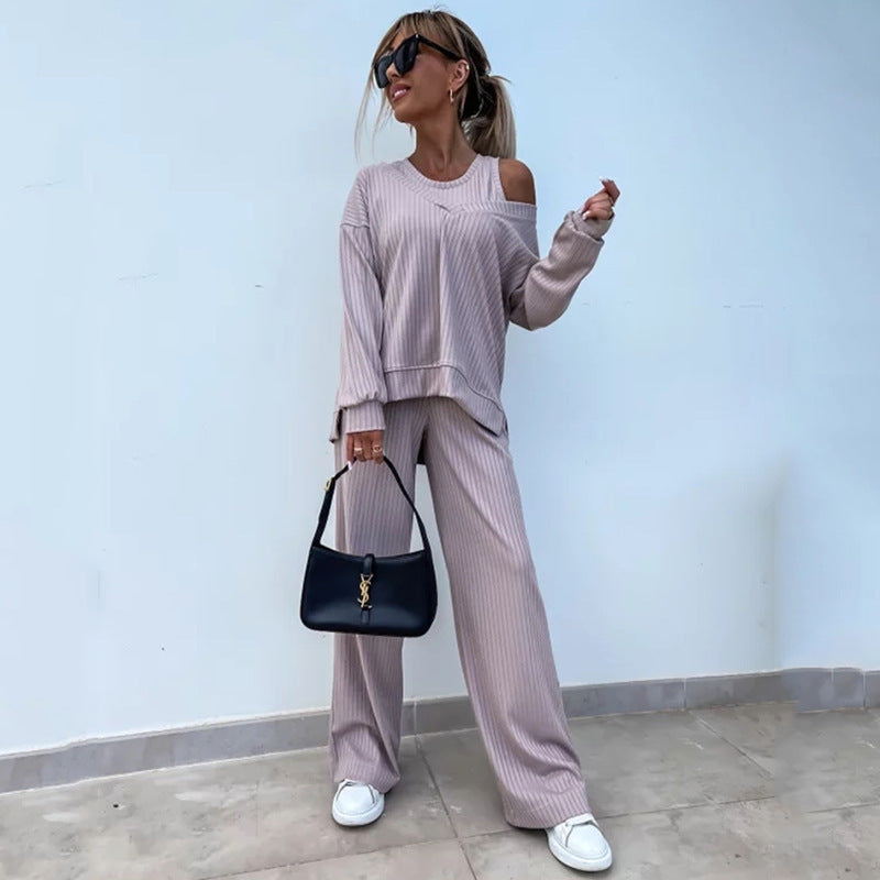 Women's elegant ribbed two-piece lounge set with one-sided off-shoulder cut and wide palazzo pant leg Mune Fashion