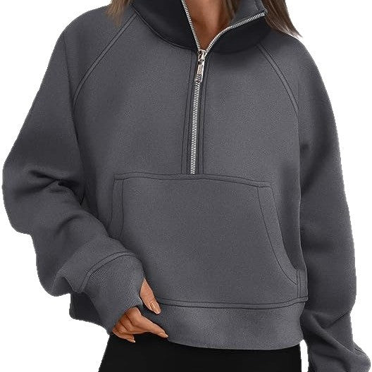 Women's short oversized fleece sweatshirt with half zip, standing collar, kangaroo pocket, and thumbhole cuffs Mune Fashion