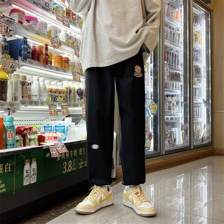 Men's fashionable sports pants with side graphic print Mune Fashion