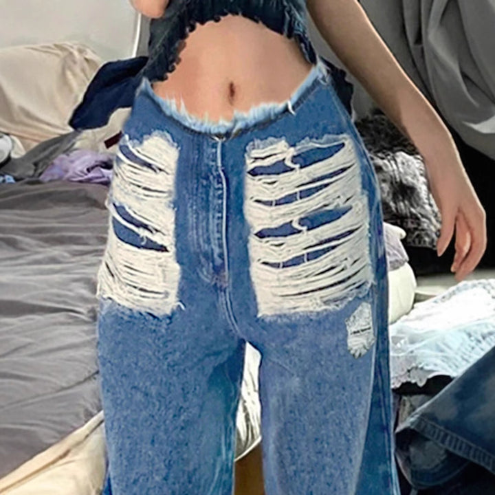 Women's high-cut wide denim jeans with heavily distressed front and raw waistband Mune Fashion