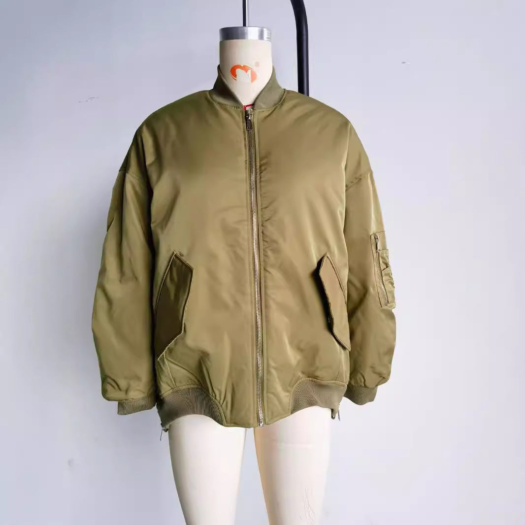 Women's oversized bomber jacket with padded contrast lining, sleeve zipper, and extended hem Mune Fashion