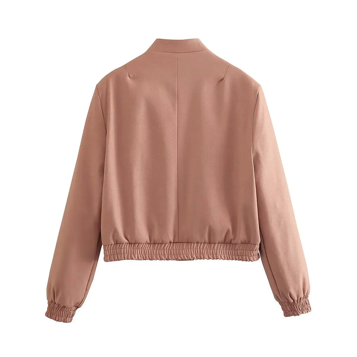 Women's short bomber jacket with stand-up collar, snap button placket, patch pockets, and elastic hem Mune Fashion