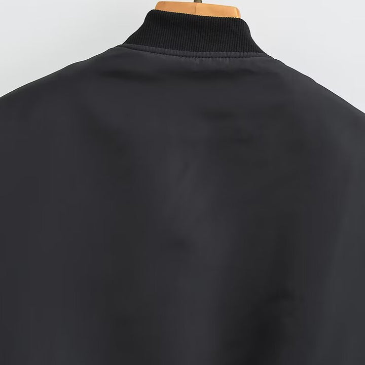 Women short cut nylon bomber jacket with shiny surface, padded lining and metal zipper Mune Fashion