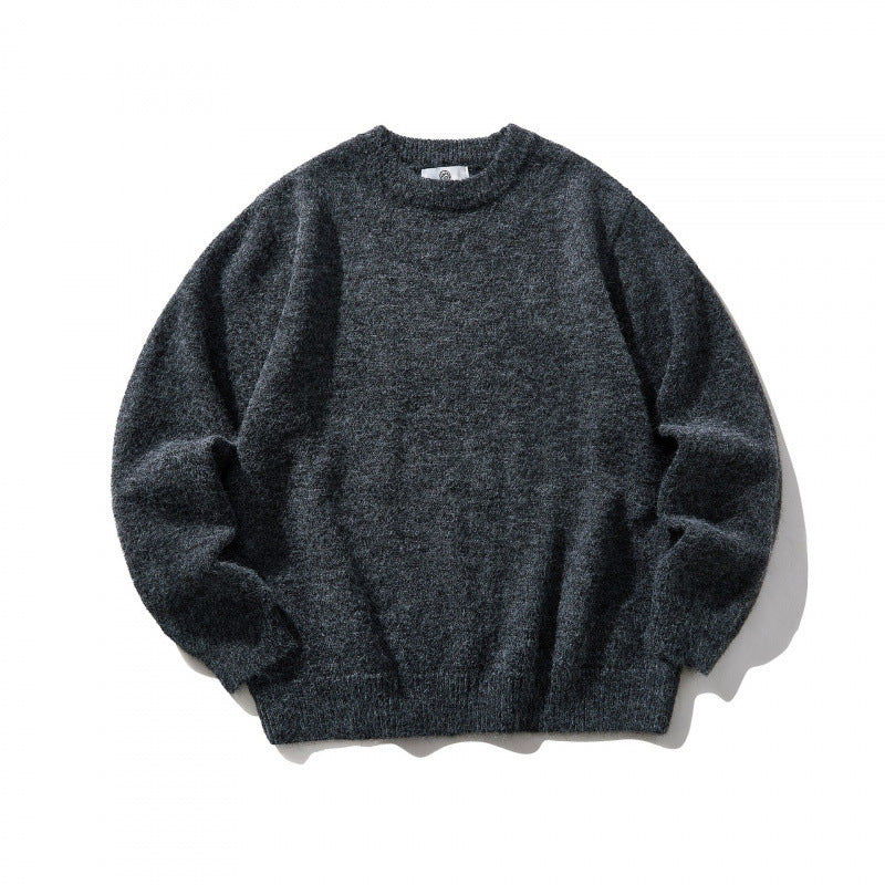 Unisex Oversize fine knit sweater with round neckline, ribbed cuffs, and mottled wool blend Mune Fashion