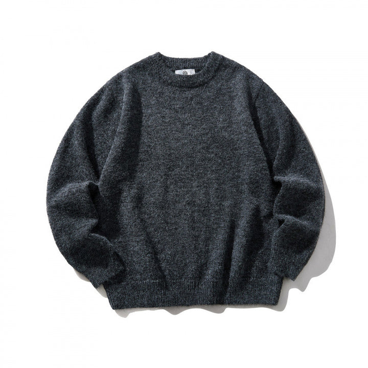 Unisex Oversize fine knit sweater with round neckline, ribbed cuffs, and mottled wool blend Mune Fashion
