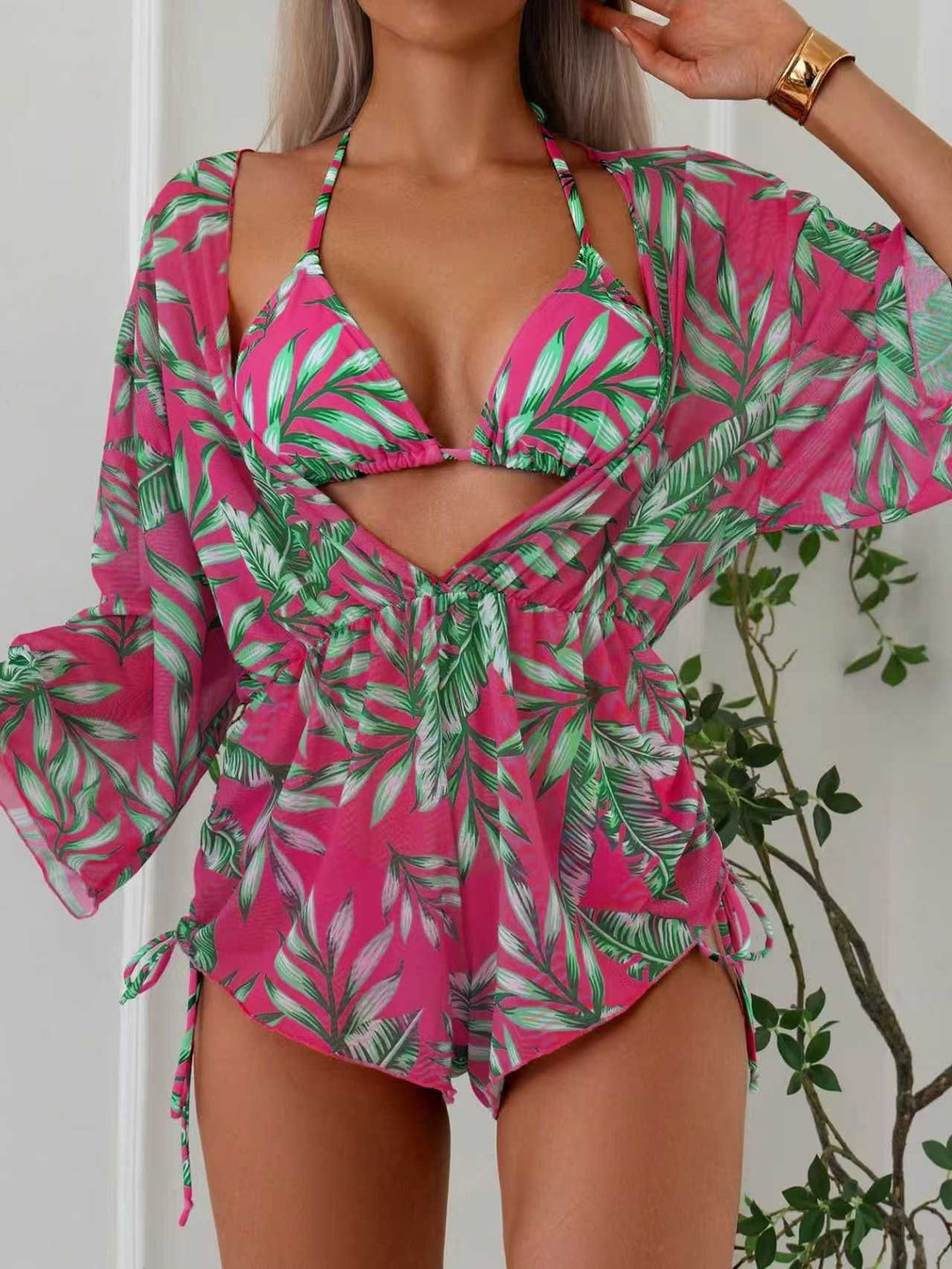 Women's swimsuit with elegant V-neckline and playful palm print Mune Fashion