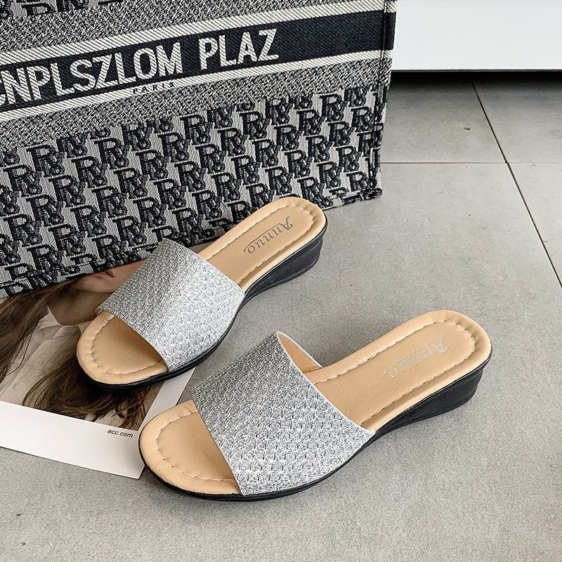 Women's glitter slide sandals with wide strap front, open toe area, cushioned comfort footbed, and lightweight wedge heel Mune Fashion