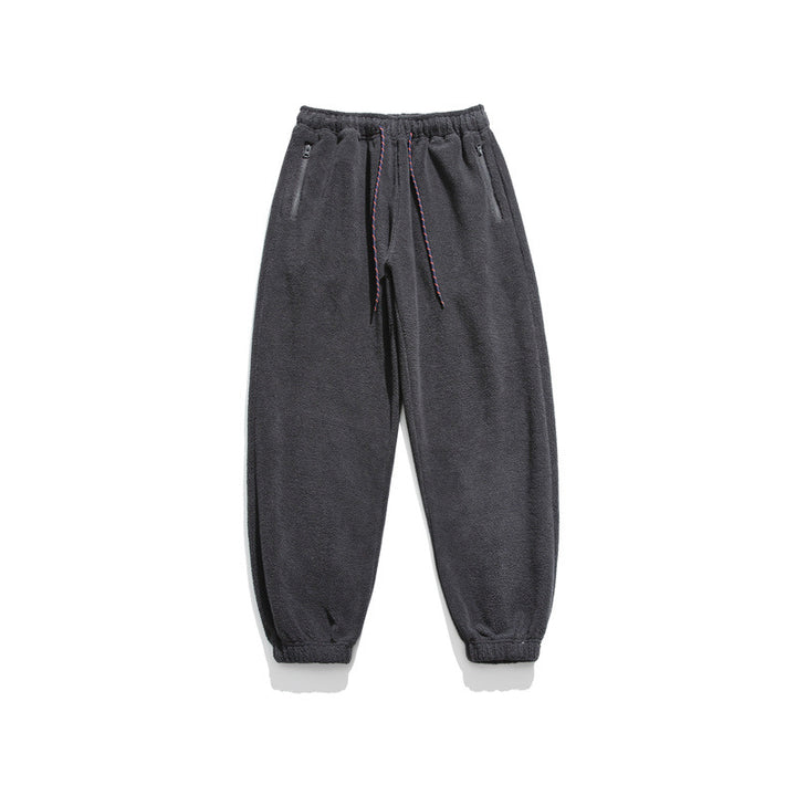 Men's wide-cut fleece jogging pants with elastic cuffs and side pockets Mune Fashion