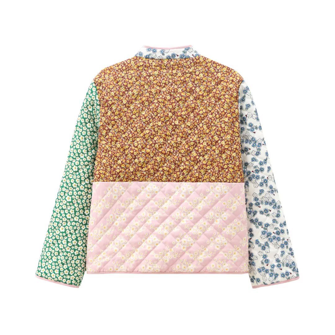 Ladies' retro-inspired quilted patchwork jacket with stand-up collar, wood button closures, and flap pockets Mune Fashion