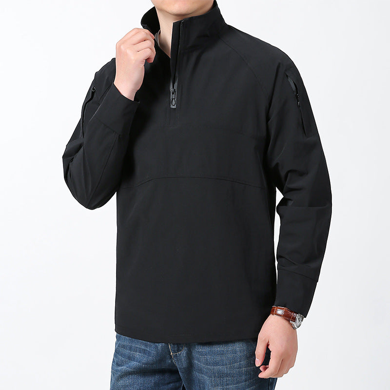 Men's softshell pullover with short zipper, arm pocket, and raglan sleeves Mune Fashion