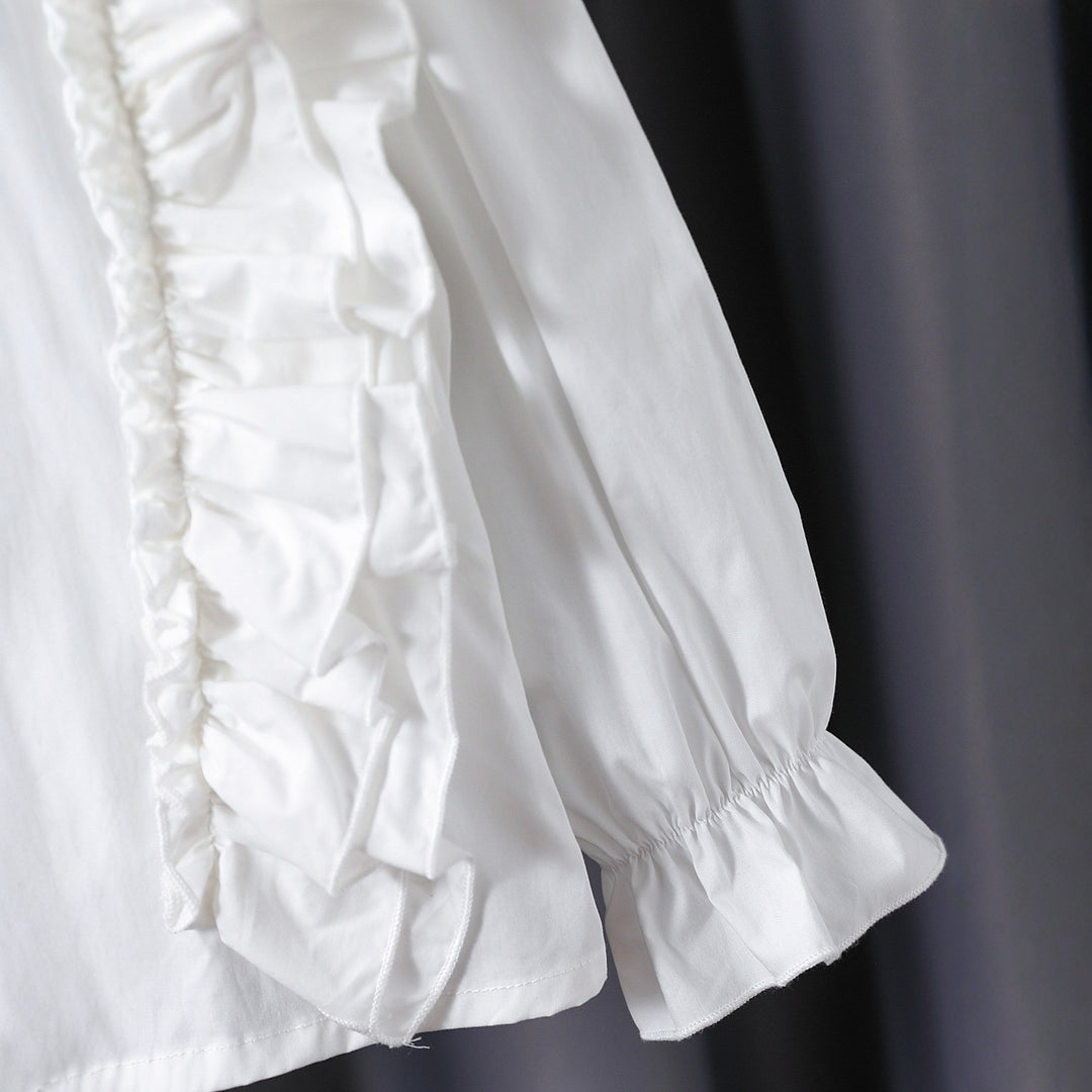 Girls blouse with ruffle details and elegant puff sleeves Mune Fashion