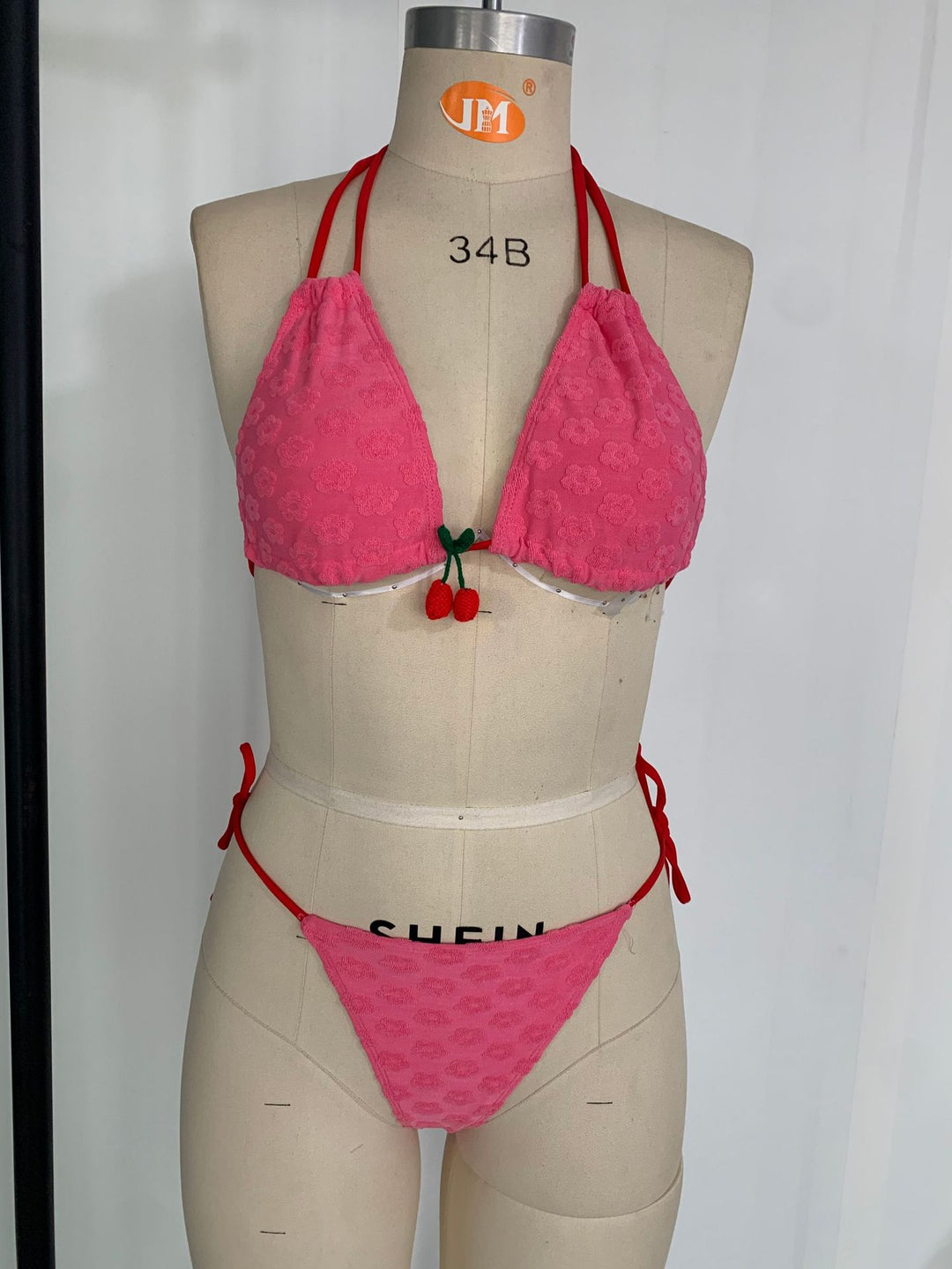 Women Triangle Bikini with playful decorative element Mune Fashion