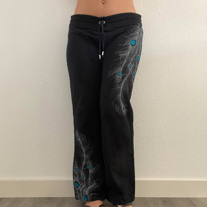 Ladies' wide lounge pants with drawstring, high comfort waistband and peacock feather print Mune Fashion