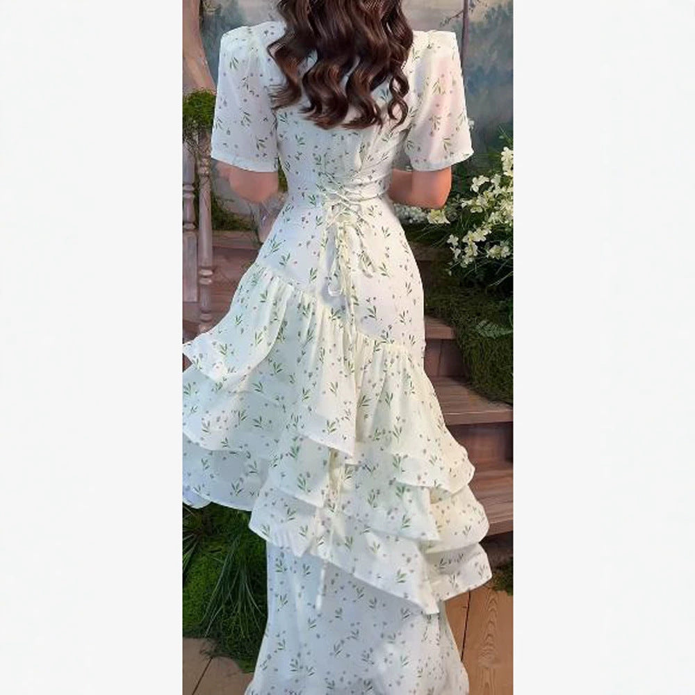 Women’s maxi dress in vintage-romantic style with asymmetric ruffles and puff sleeves Mune Fashion