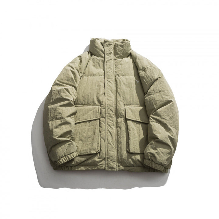 Unisex Oversized padded quilted jacket with high stand collar, large flap pockets and crinkle effect Mune Fashion