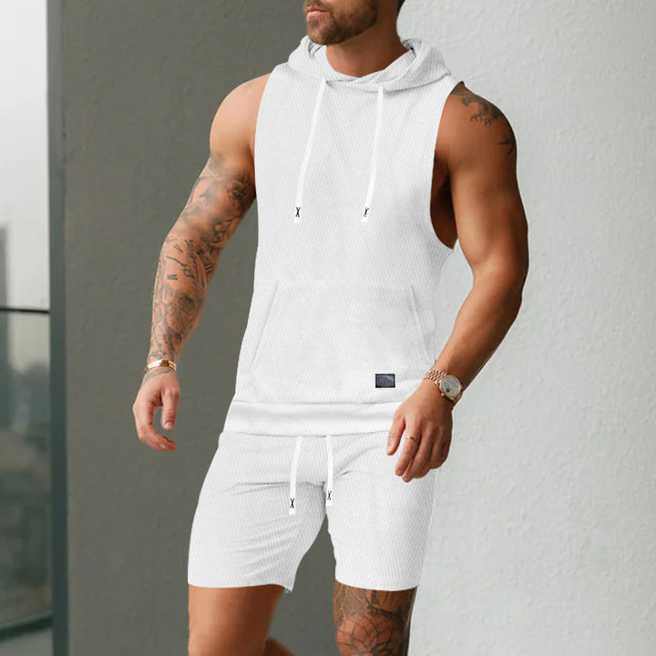 Men's sleeveless hoodie vest set made of textured cotton blend with kangaroo pocket and drawstring shorts Mune Fashion