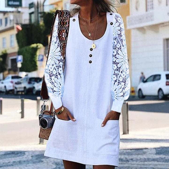 Women's relaxed linen mini dress with floral crochet sleeves, U-neckline and patch pockets Mune Fashion