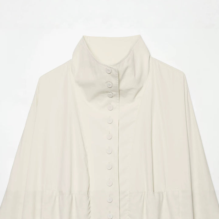 Women's cropped jacket with high stand-up collar, full button placket, and balloon sleeves Drune